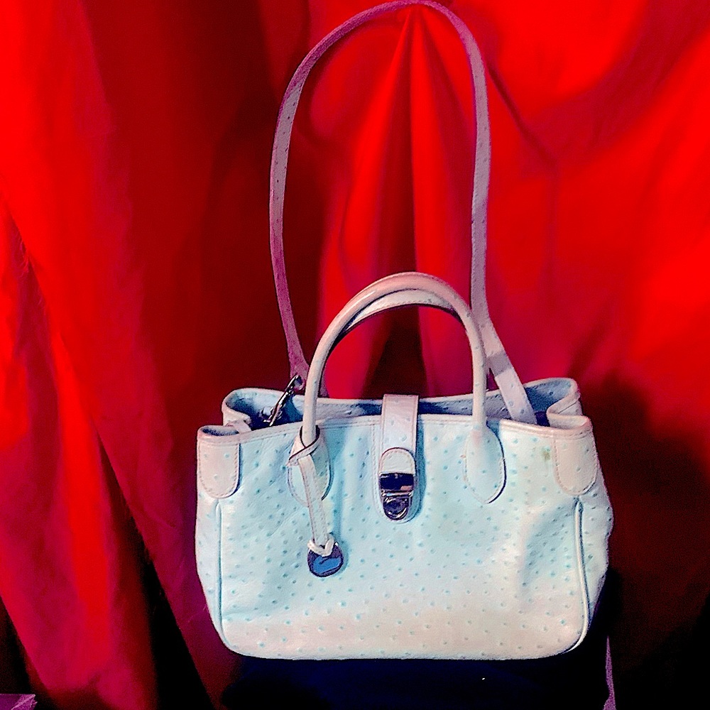 Donnie and Bourke purse like new light west will negotiate on price